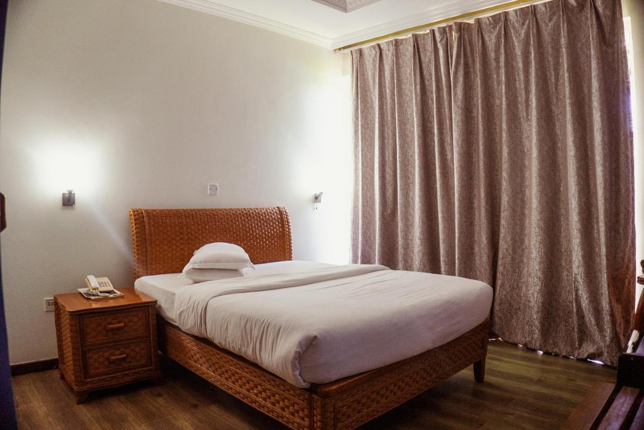 Tanga Beach Resort&Spa Bagian luar foto